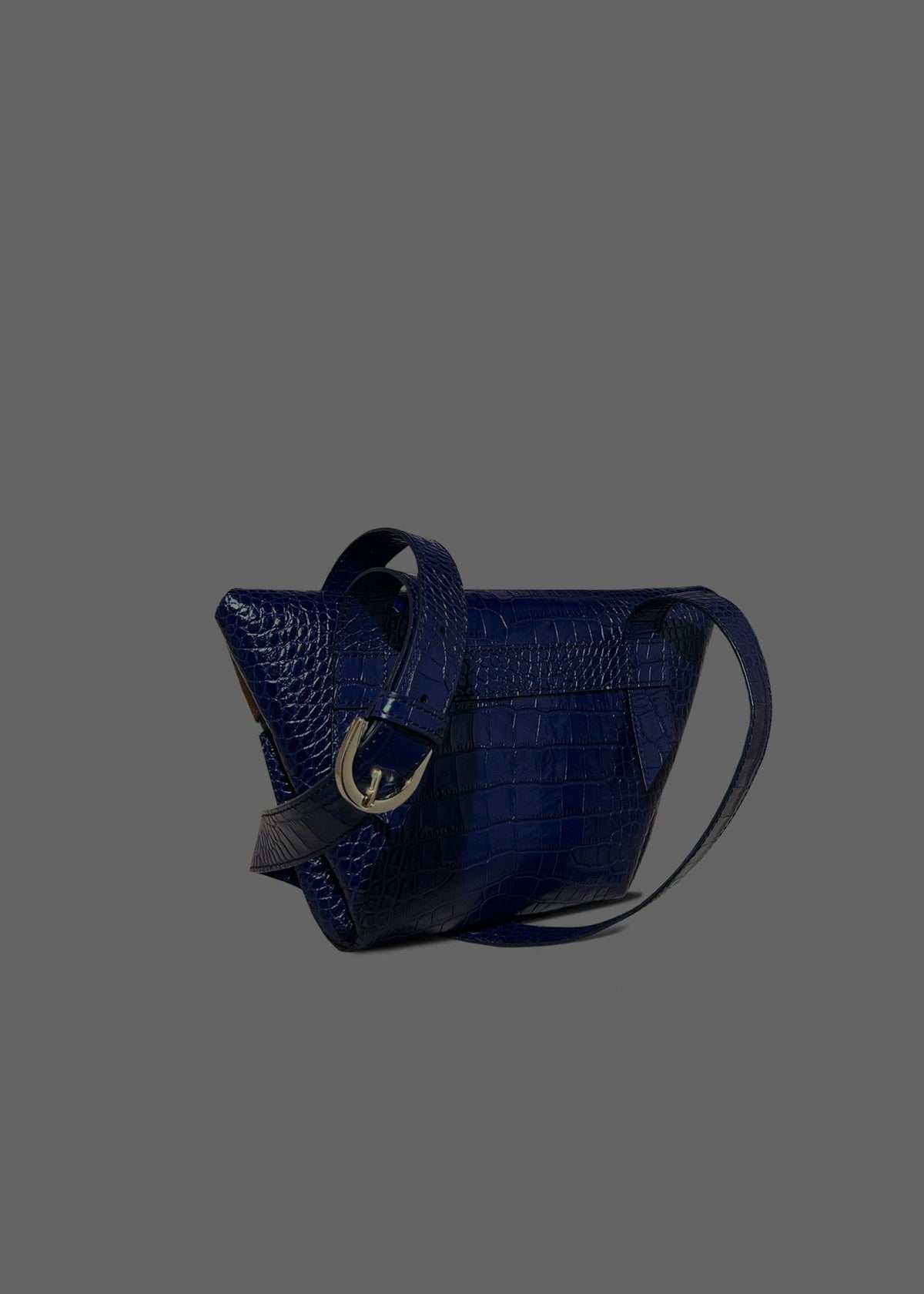 The Carrier Leather Cross Shoulder Bag in color Navy Embossed Croc