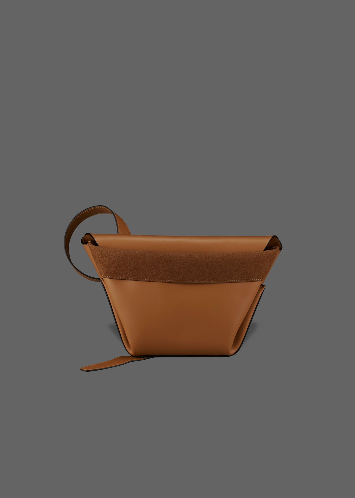 The Carrier Leather Cross Shoulder Bag in color Tan