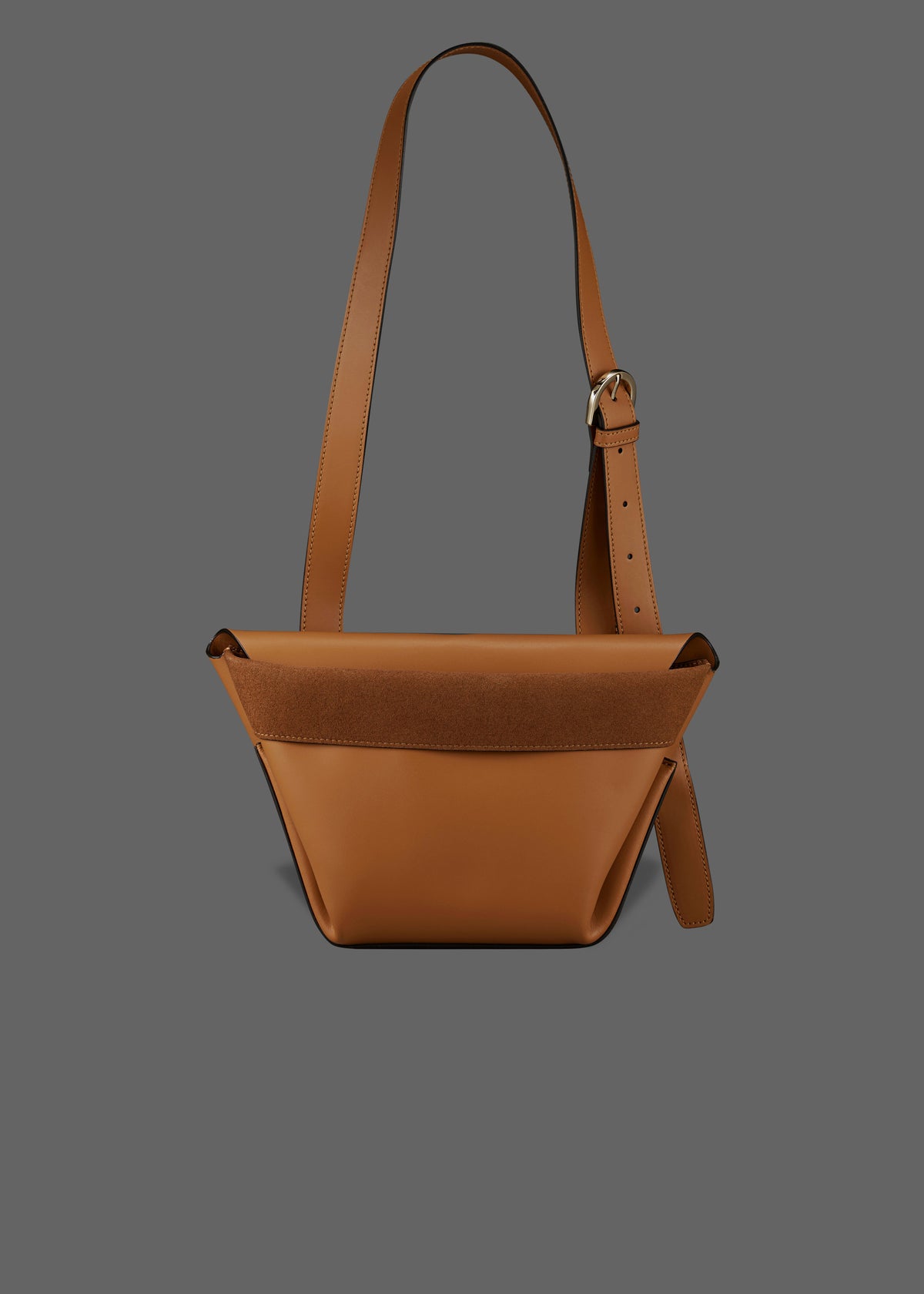 The Carrier Leather Cross Shoulder Bag in color Tan