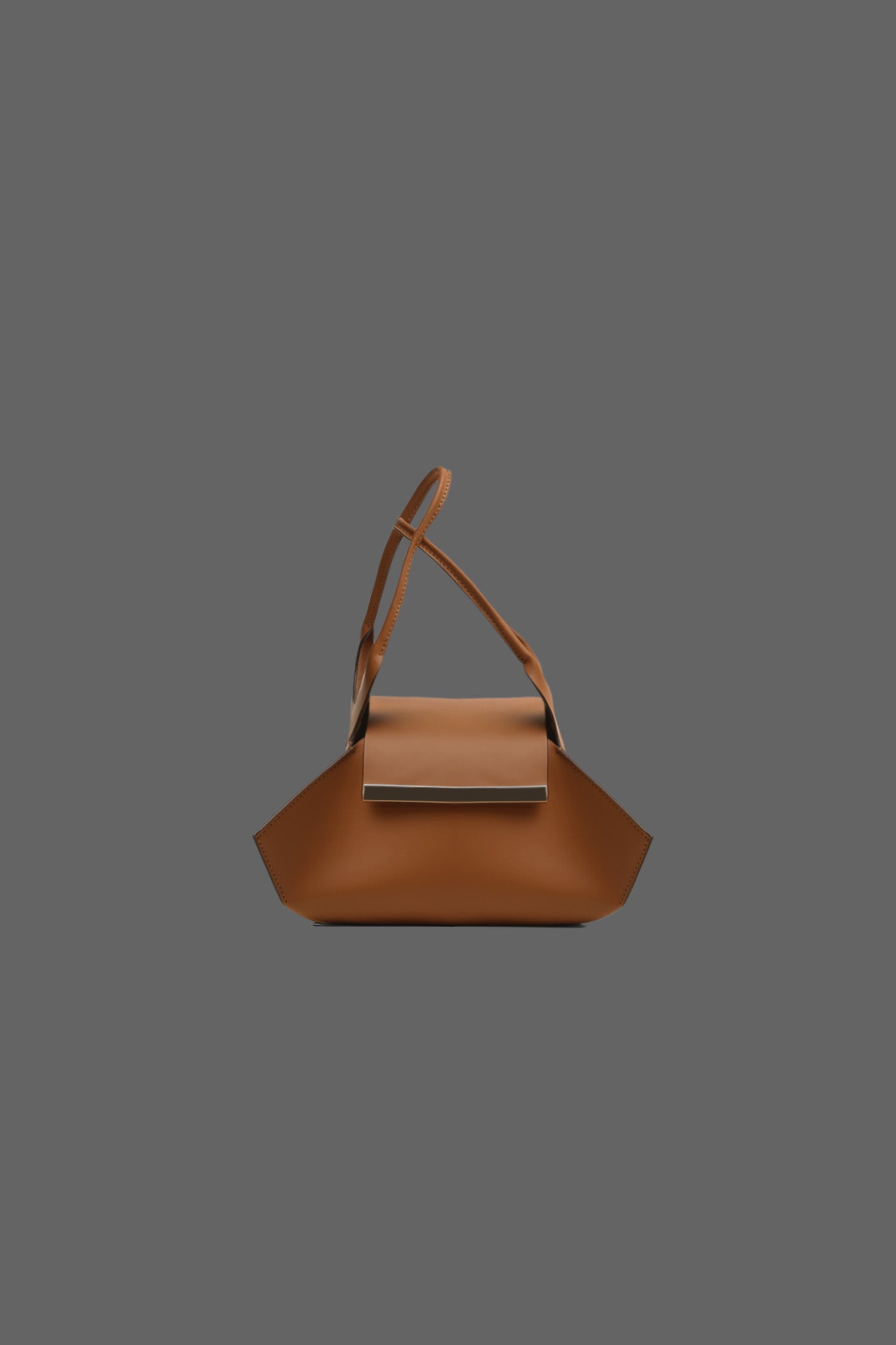 The Kutchra Leather Handbag in color Tan