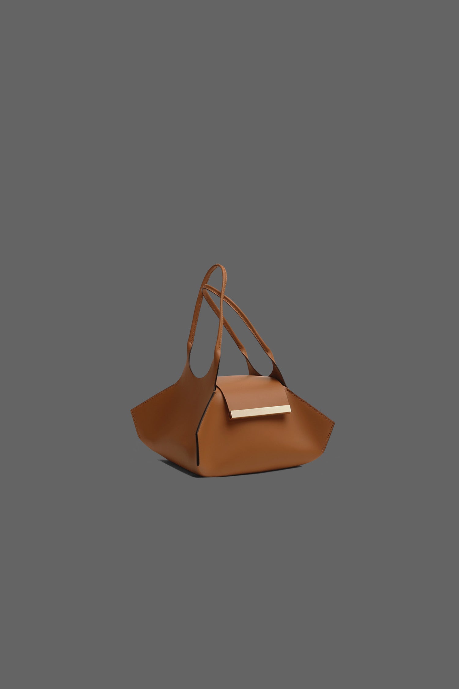 The Kutchra Leather Handbag in color Tan