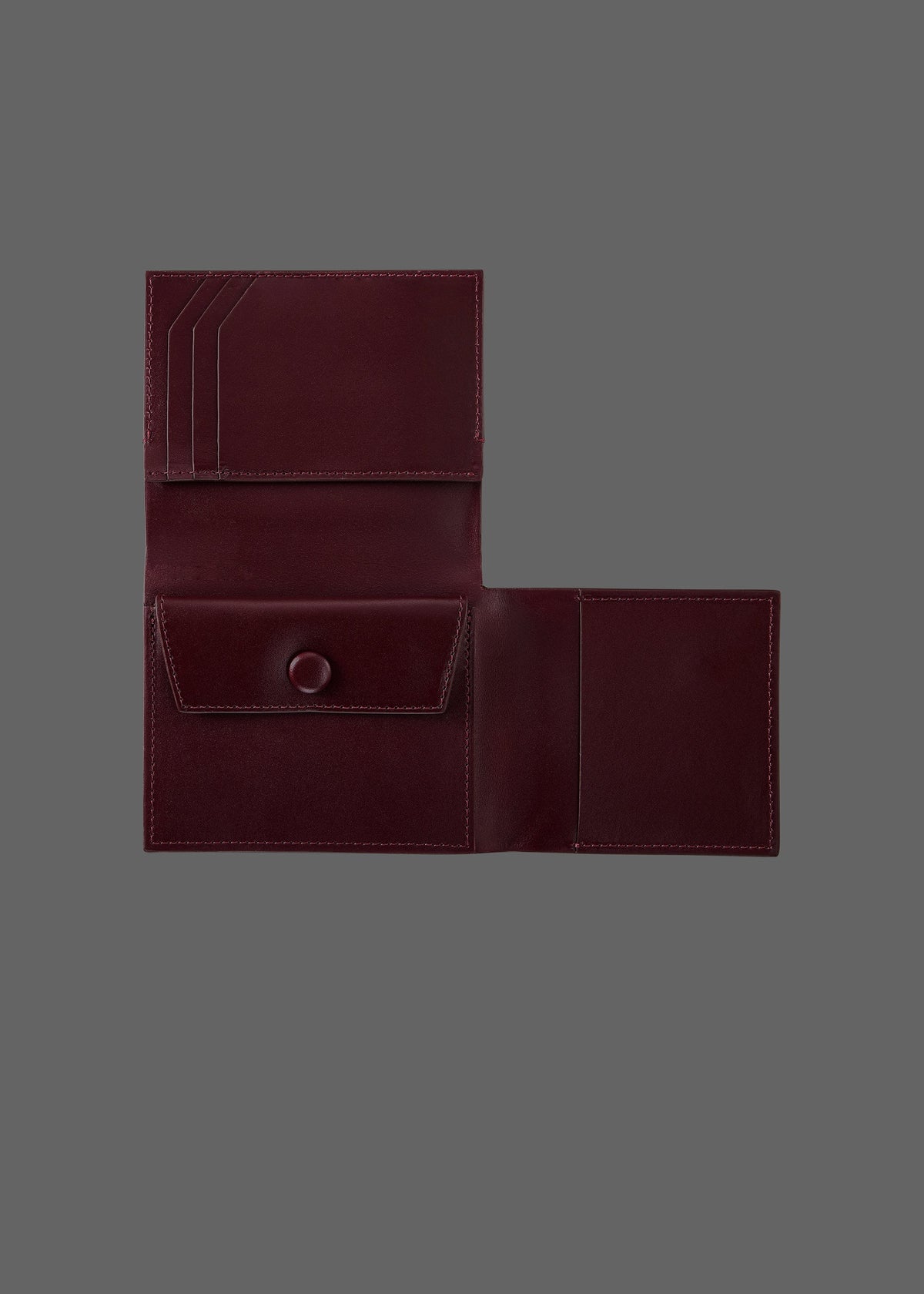The Stacked Leather Tri-Fold Wallet in color Burgundy