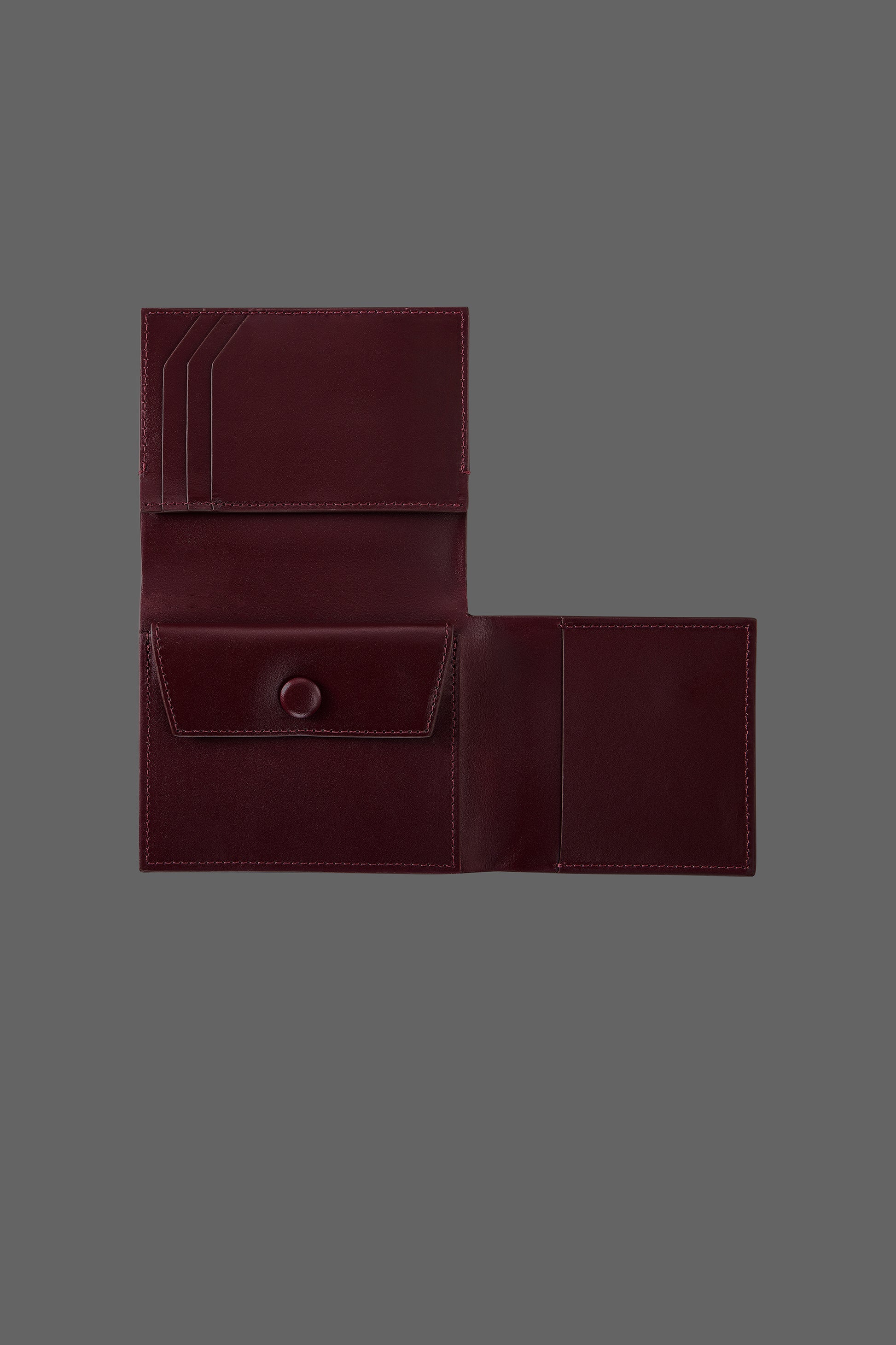 The Stacked Leather Tri-Fold Wallet in color Burgundy