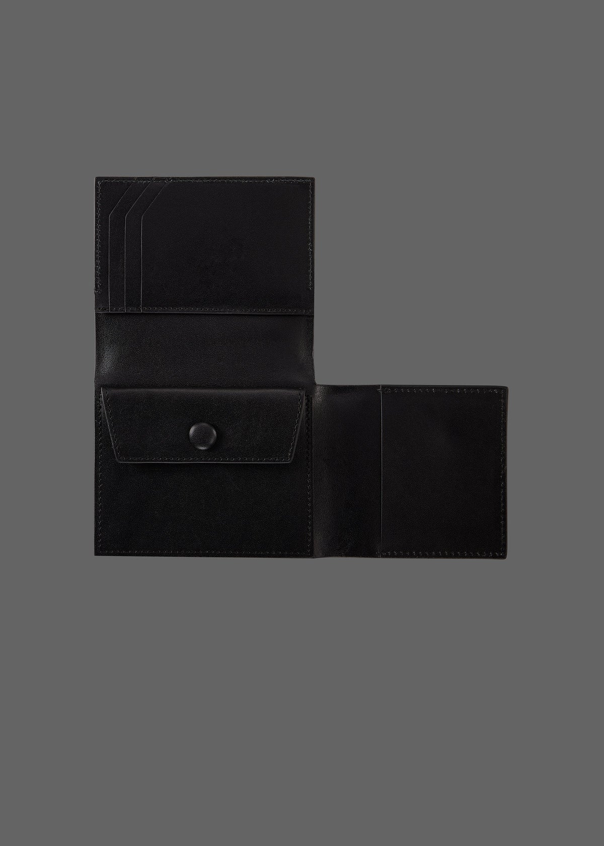 The Stacked Leather Tri-Fold Wallet in color MicroGrain Black