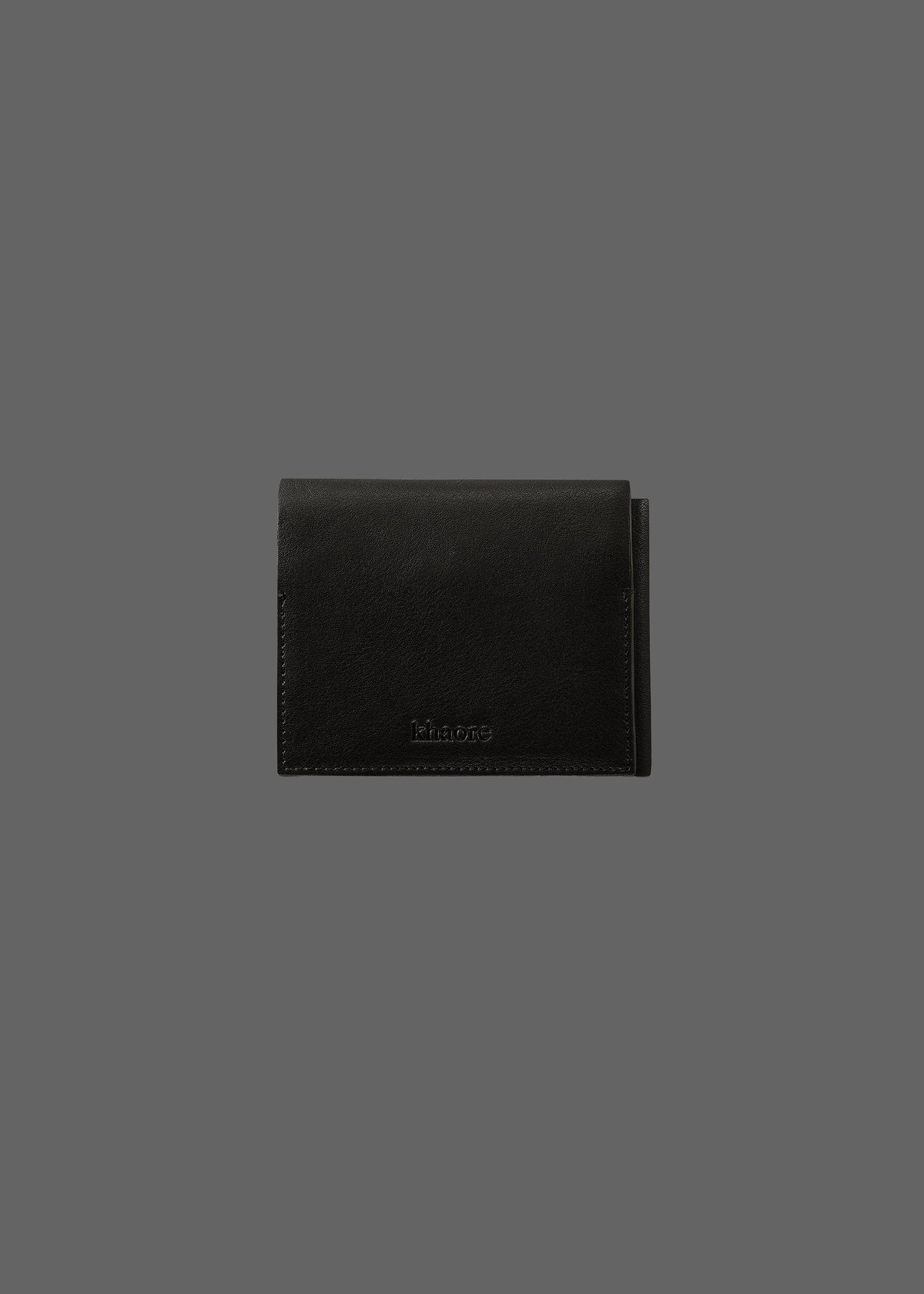 The Stacked Leather Tri-Fold Wallet in color Pebble Black