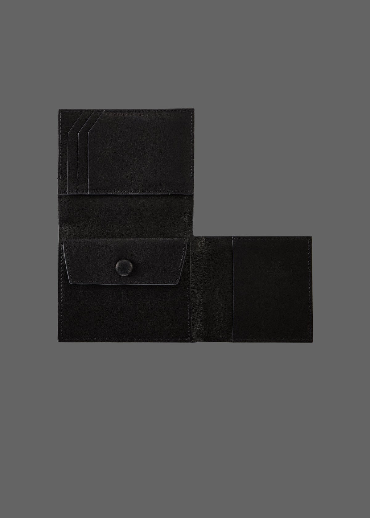 The Stacked Leather Tri-Fold Wallet in color Pebble Black