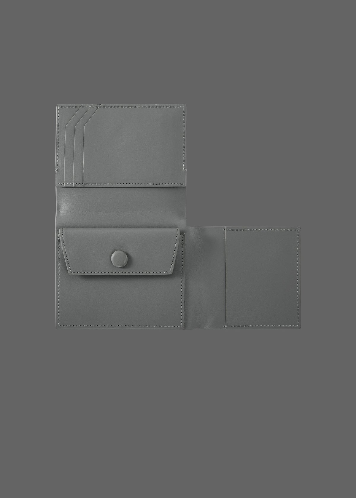The Stacked Leather Tri-Fold Wallet in color Stone Grey