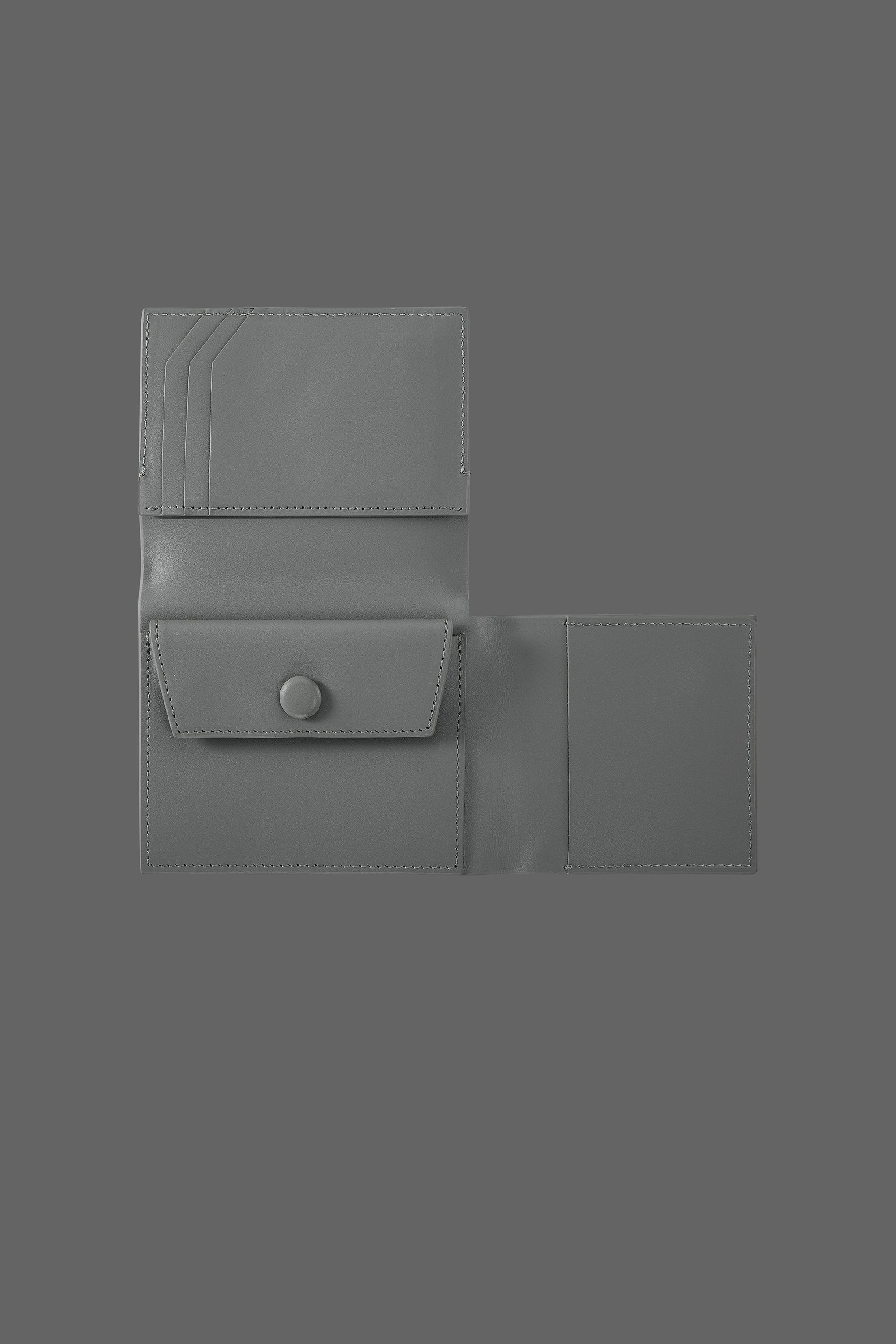 The Stacked Leather Tri-Fold Wallet in color Stone Grey