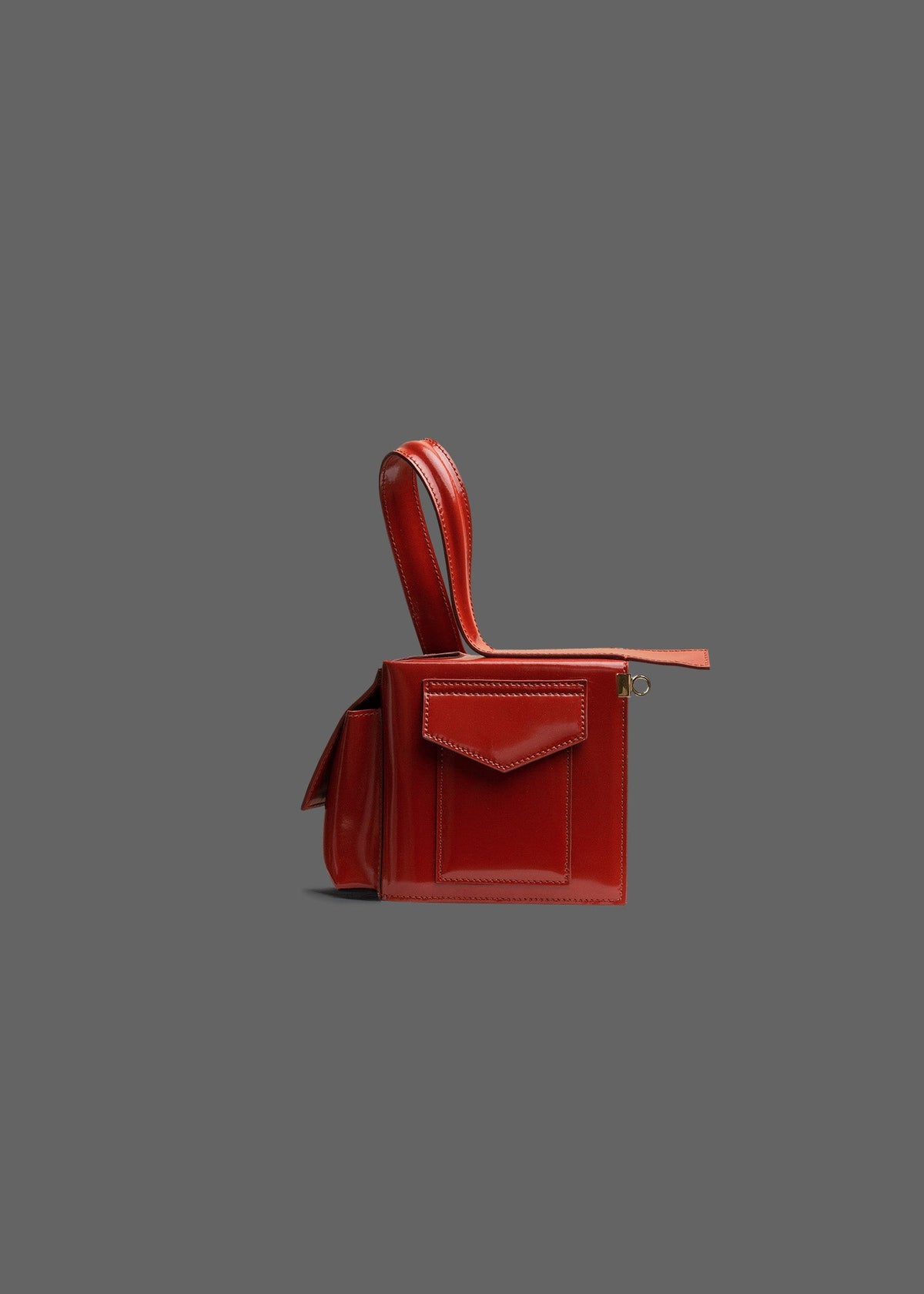 The Corner Guard Leather Handbag in color Rust