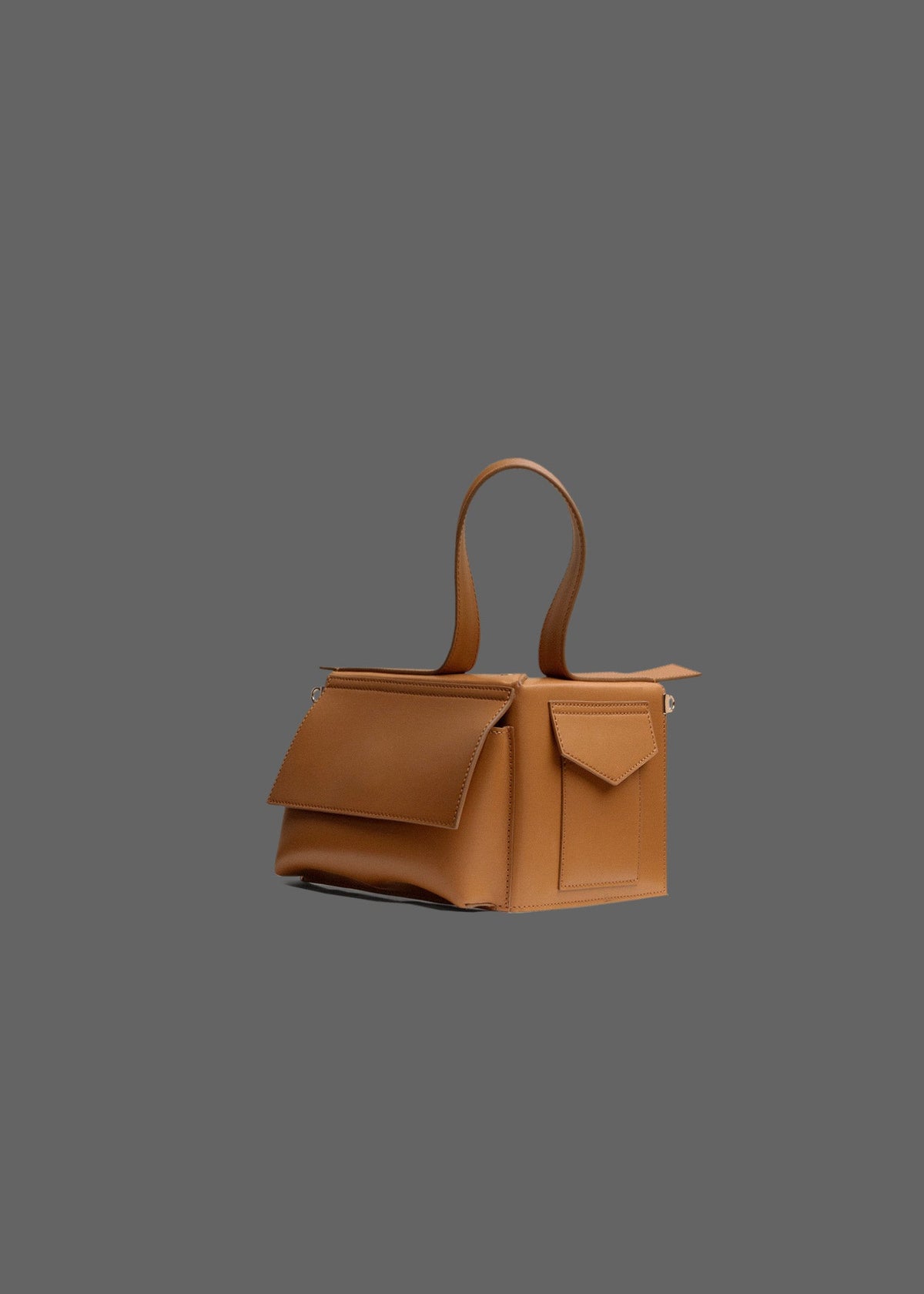 The Corner Guard Leather Handbag in color Tan