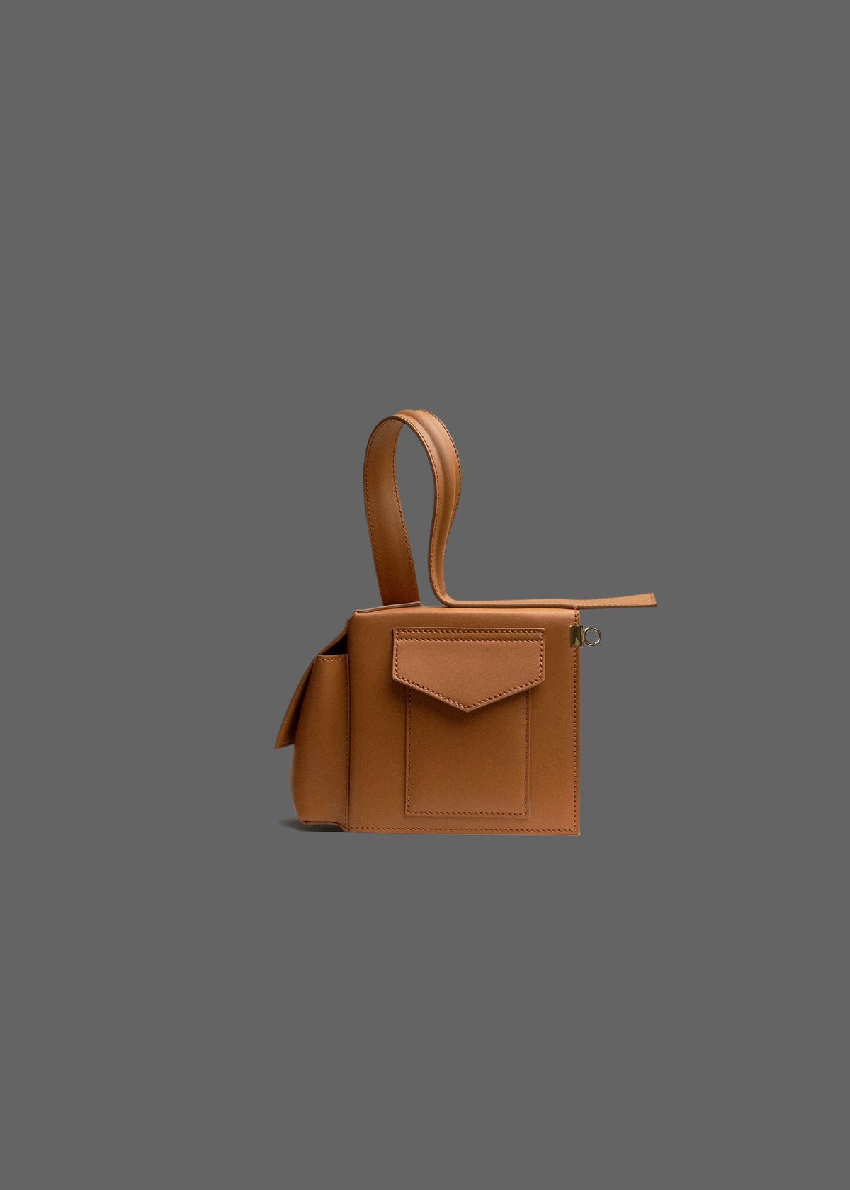 The Corner Guard Leather Handbag in color Tan