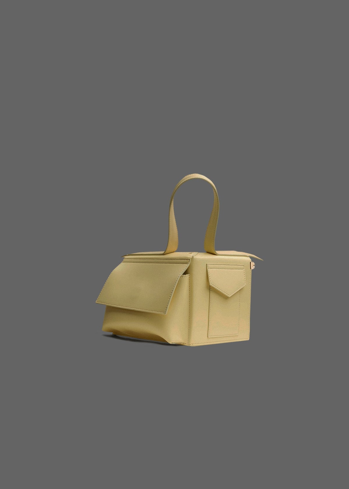 The Corner Guard Leather Handbag in color Eggshell Yellow