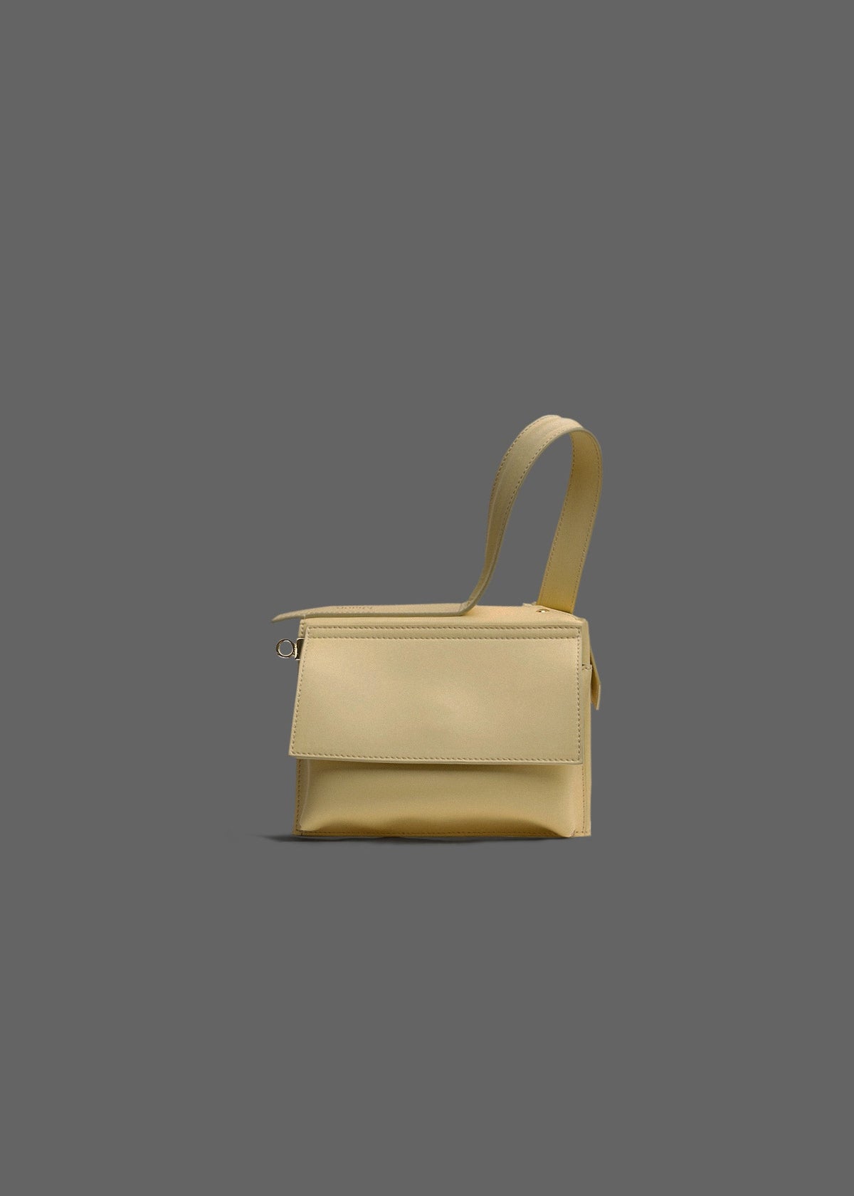 The Corner Guard Leather Handbag in color Eggshell Yellow