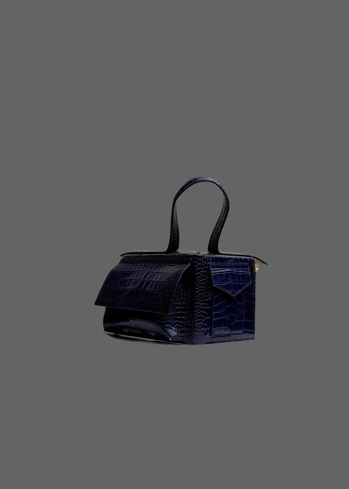 The Corner Guard Leather Handbag in color Navy Embossed Croc